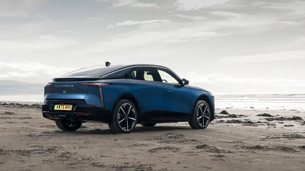 DS No.8 static, rear three quarter view, parked by a beach